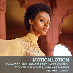 KEVIN.MURPHY MOTION.LOTION lotion texture on pump highlighting lightweight spread