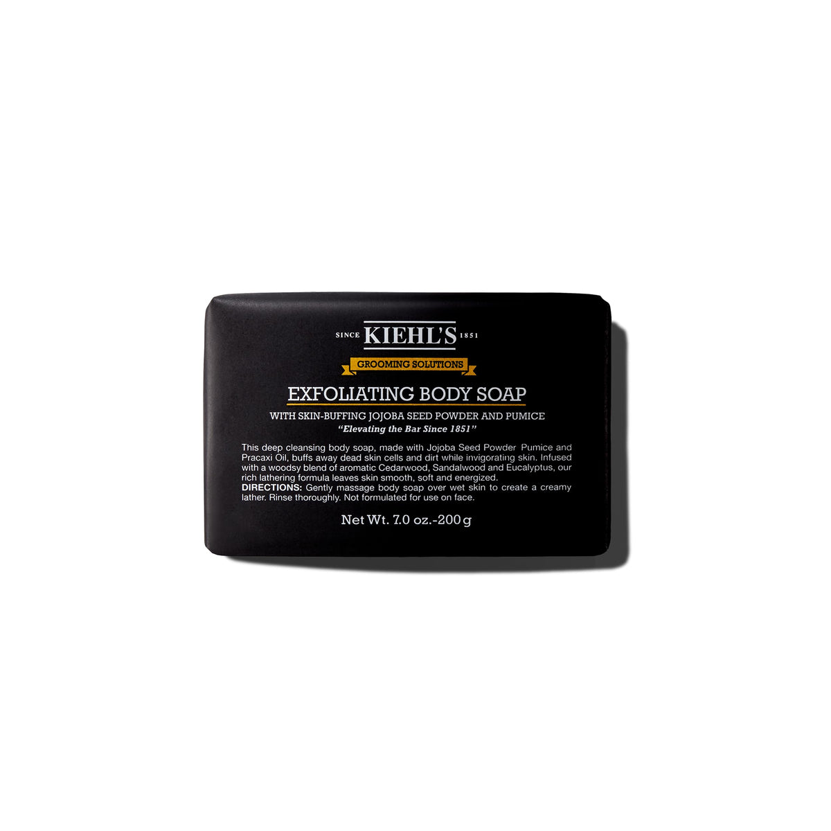 Kiehl's front packaging of exfoliating body bar showing product and woodsy scent benefit