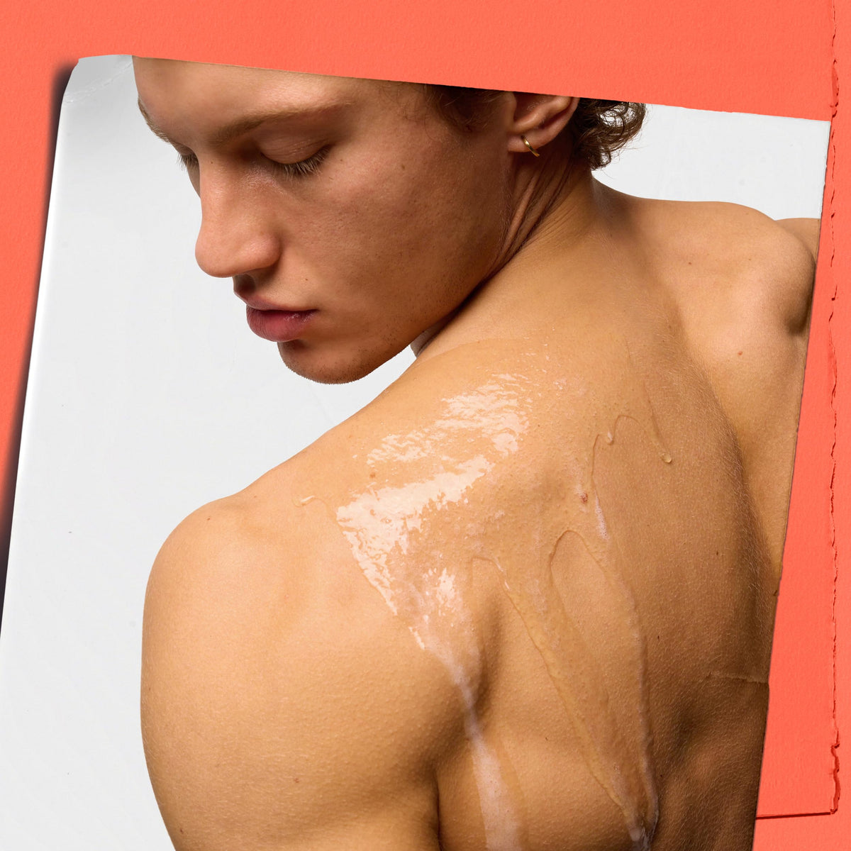 Kiehl's foamy texture on hand illustrating light lather and gentle cleansing action