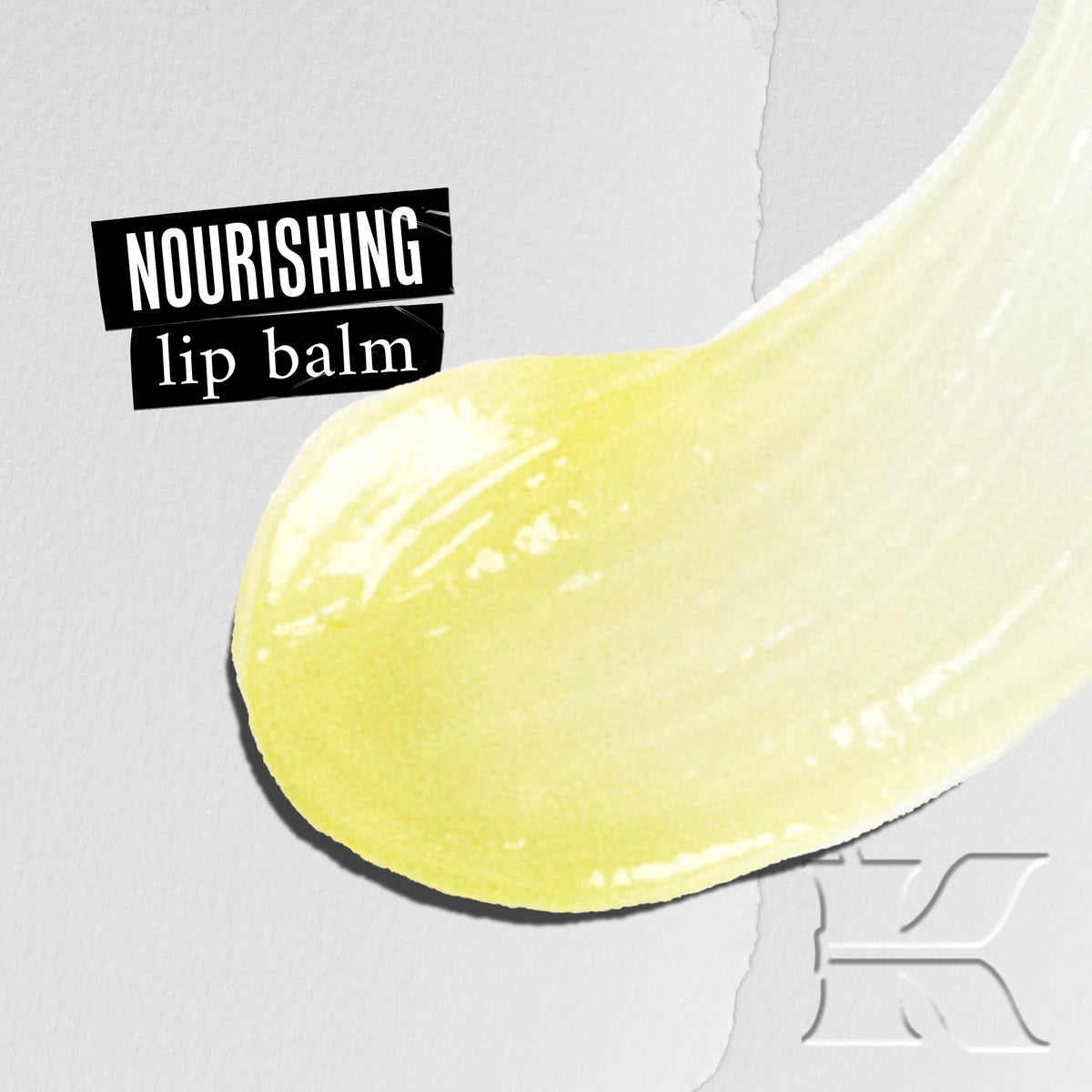 Kiehl's Lip Balm #1 texture close-up displaying smooth clear balm and moisturizing finish