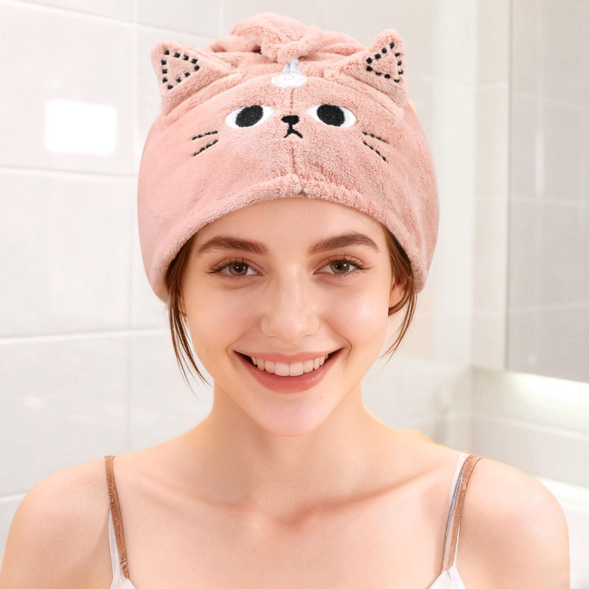 KIGOTWIN towels on bathroom shelf styled with bath items showing family-friendly use