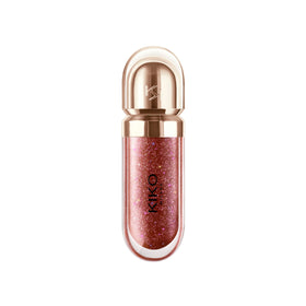KIKO Milano lipgloss placed on dressing table showing travel-ready design and luxe detail