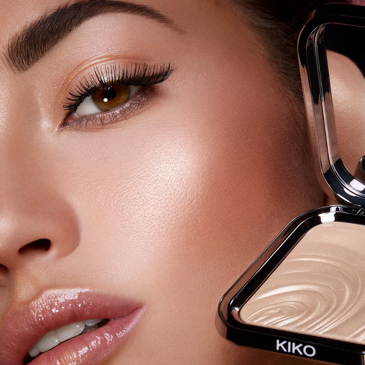 KIKO Milano application on cheekbone demonstrating dewy highlight and lift
