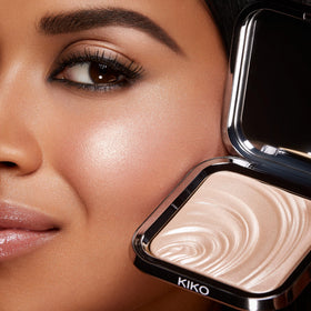KIKO Milano size and scale comparison with brush showing travel-friendly compact