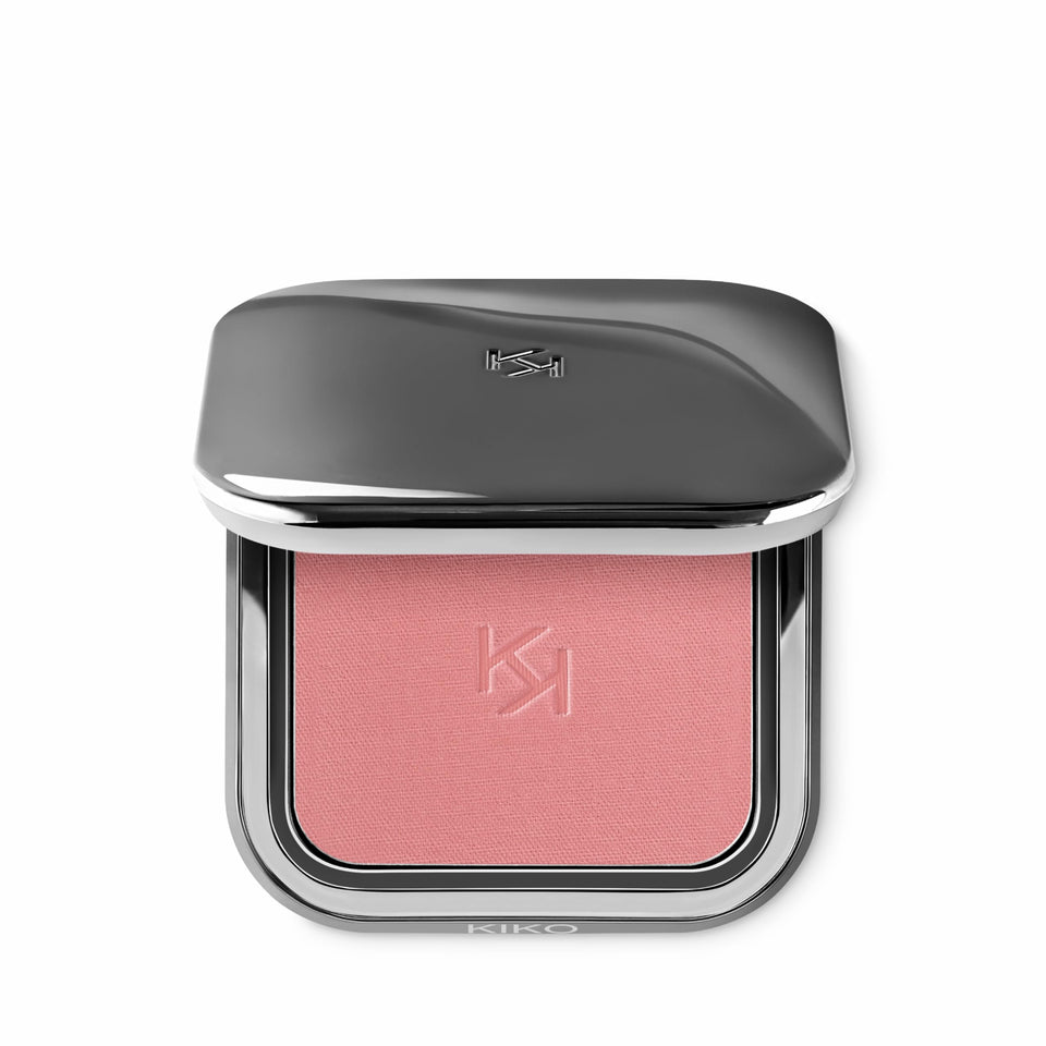 KIKO Milano compact front view showing sleek gunmetal case and KK logo benefit: portable elegance