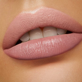Kiko Milano Unlimited Stylo applied on hand demonstrating buildable coverage and blendability