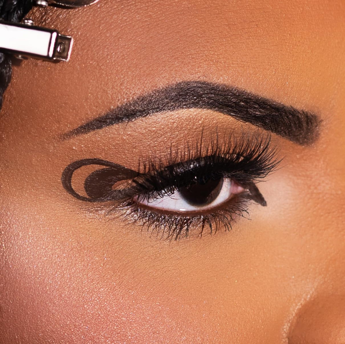 KimChiChic swatch stroke on skin demonstrating high pigment payoff and blendability benefit