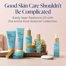 Kind Science oil spread on skin demonstrating lightweight absorption and glow