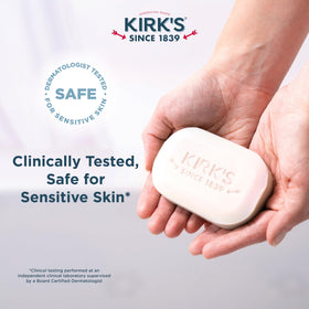 Kirk's 4 oz bar in hand to show actual size and travel-friendly compactness