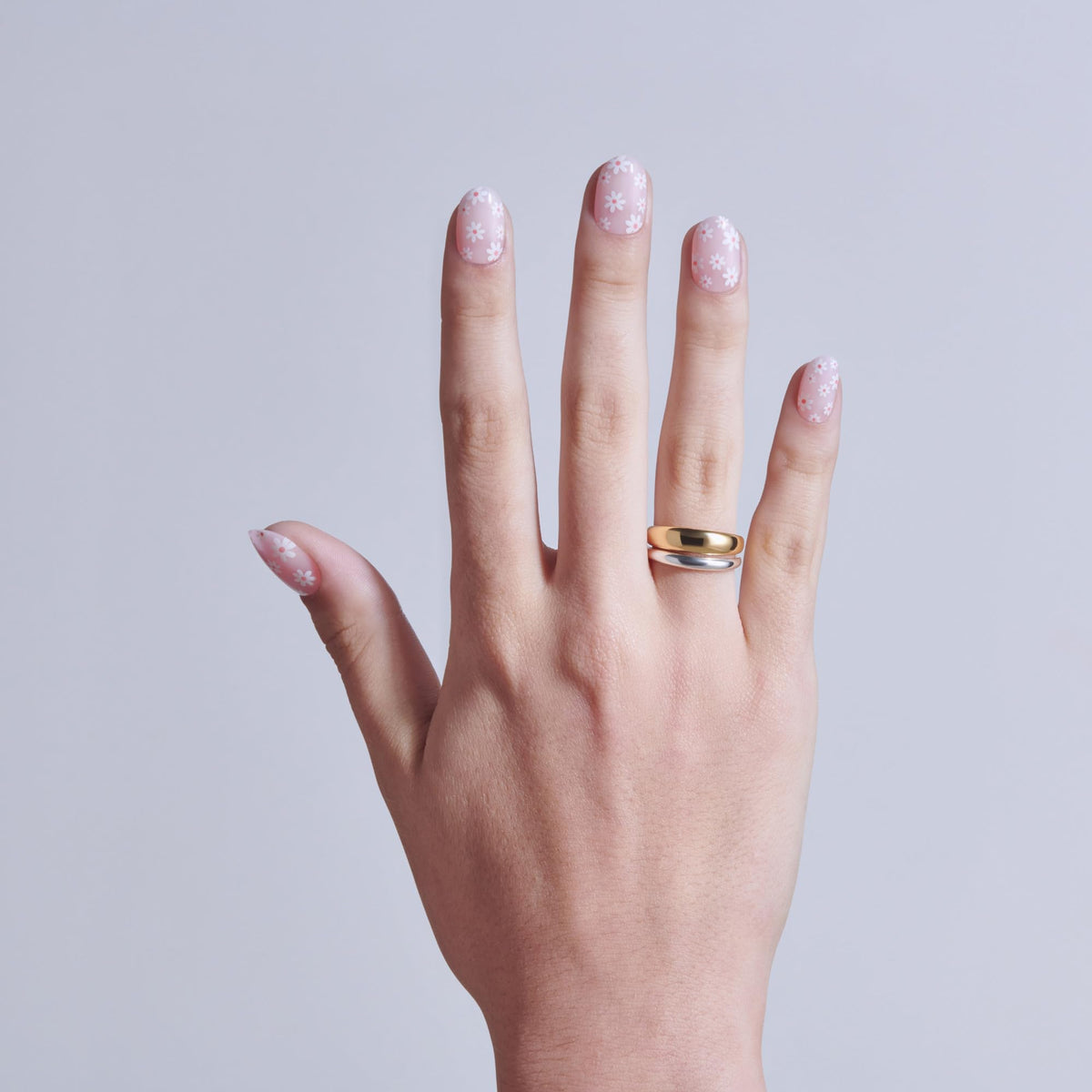KISS Core side profile of a press-on showing thin flexible nail construction and comfort