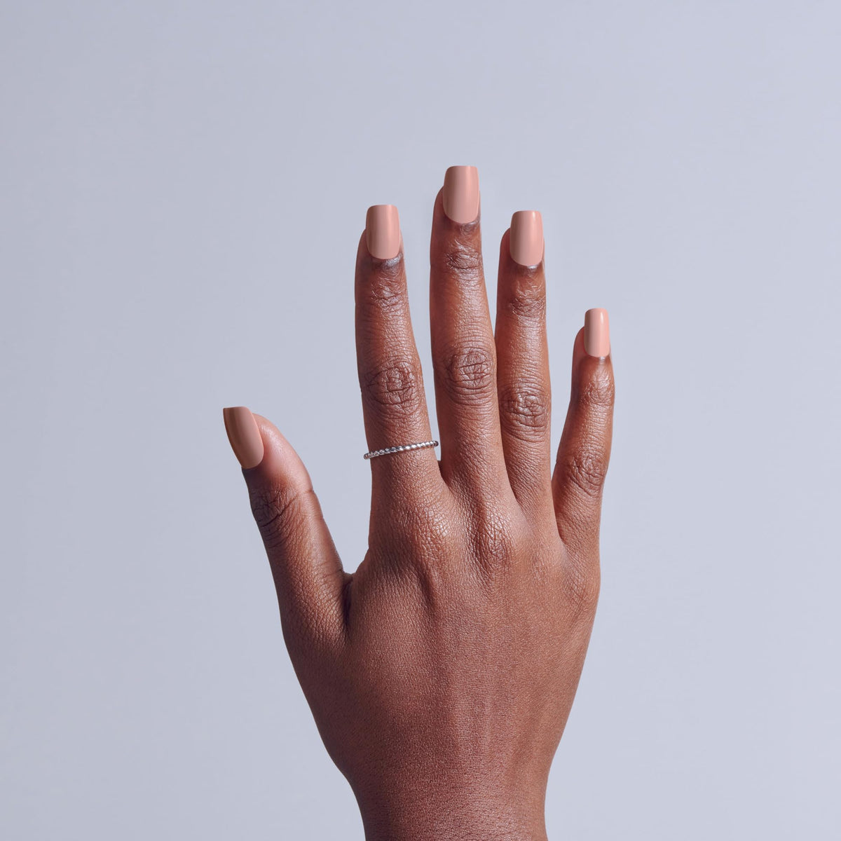 KISS Embullience close-up of nail surface texture showing smooth neutral finish