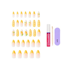 KISS Glam glue and tools layout including 2g glue, stick, file for complete at-home application