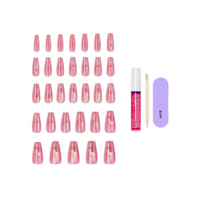 KISS nails held in hand to show true length and scale for styling