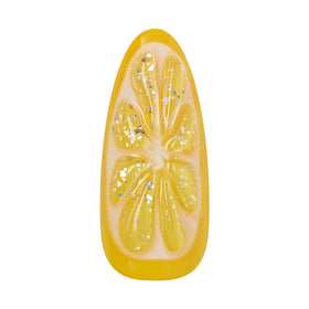 KISS Glam worn on hand in lifestyle scene demonstrating bold yellow color for events