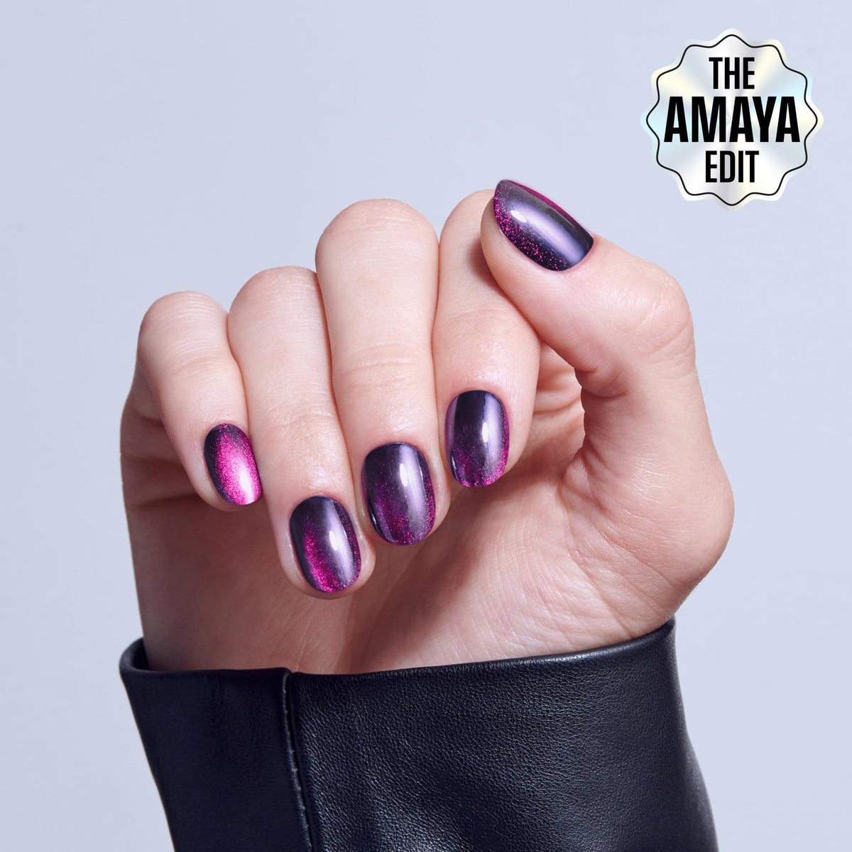 KISS close-up of a single purple round press-on nail highlighting smooth surface and fit