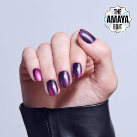 KISS close-up of a single purple round press-on nail highlighting smooth surface and fit