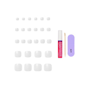 KISS Glam glue bottle and tools displayed for easy at-home use
