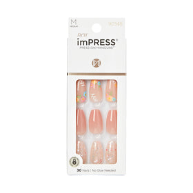 KISS packaging showing full press-on manicure kit and benefits