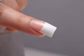 KISS application of a tip on a hand, saves time on manicures