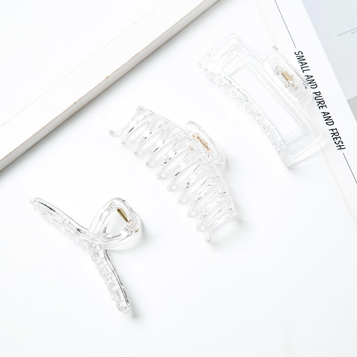 Kitiin size comparison in hand demonstrating compact, travel-friendly dimensions