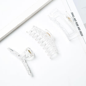 Kitiin size comparison in hand demonstrating compact, travel-friendly dimensions