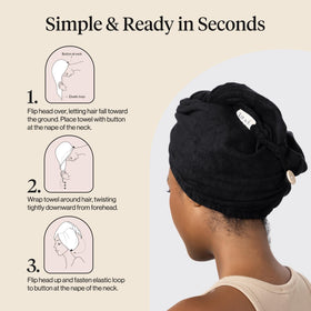 Kitsch black towel flat lay with bath items suggesting salon-quality drying at home