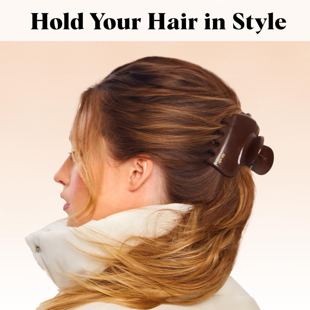Kitsch chocolate clip holding a full bun comfortably for all-day wear