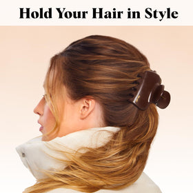 Kitsch chocolate clip holding a full bun comfortably for all-day wear