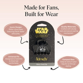 Kitsch Darth Vader held in hand to show size and easy packable benefit