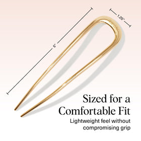 Kitsch hair pin next to a coin showing compact size for travel and purse-friendly convenience