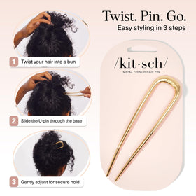 Kitsch texture close-up showing polished metal finish that glides through hair without snagging