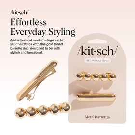 Kitsch gold barrettes close-up showing polished finish and added shine