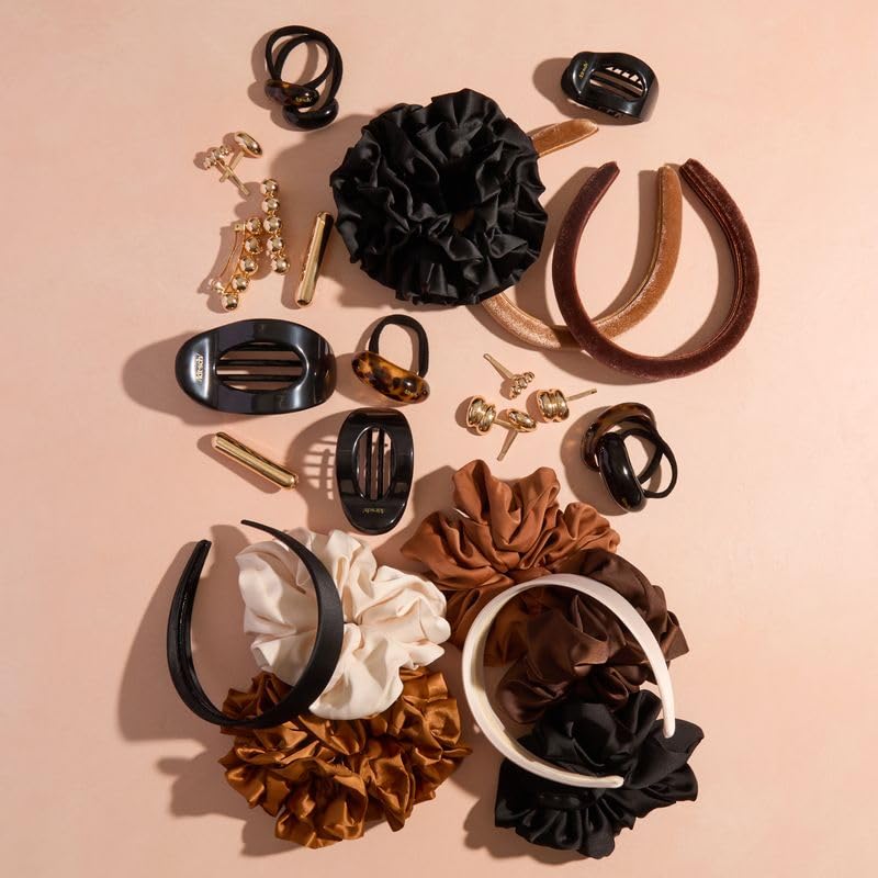 Kitsch gold barrettes in a gift-ready box highlighting ready-to-present appeal