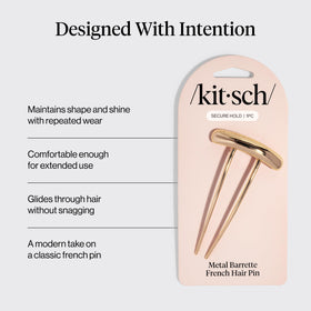 Kitsch gold hair pin securing a tidy bun, showing reliable hold during activity