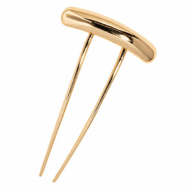 Kitsch gold hair pin styled with a dressy outfit to show accessory for special occasions