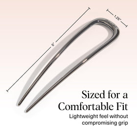 Kitsch hematite next to ruler showing compact size and easy portability for travel