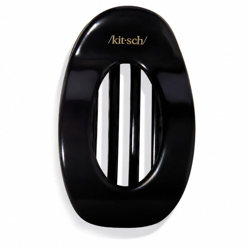 Kitsch black clip front view showing sleek flat shape and polished finish for refined styling