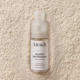 Kitsch next-to-mirror in bag for quick touch-ups and travel convenience