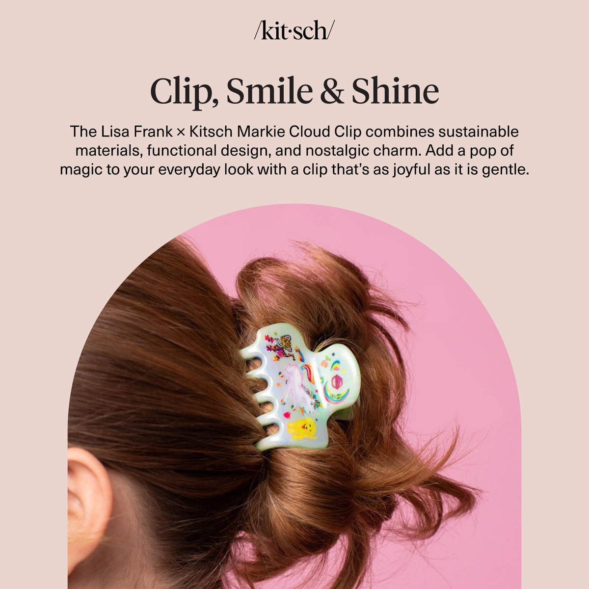 Kitsch Markie clip next to a hand for size comparison showing portable, lightweight benefit