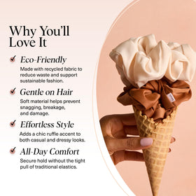 Kitsch oversized scrunchie held in hand to show scale and easy grip benefit