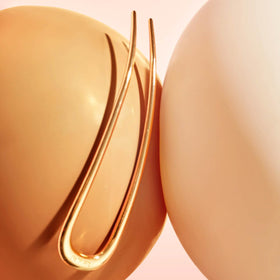 Kitsch two pins laid flat to show paired set and durable zinc alloy construction