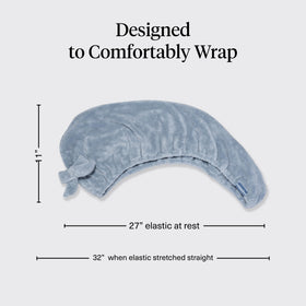 Kitsch side profile of towel secured with loop and button for slip-free convenience