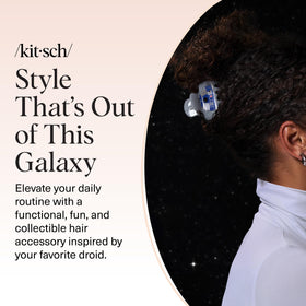 Kitsch R2‑D2 clip back label showing recycled‑plastic material benefit