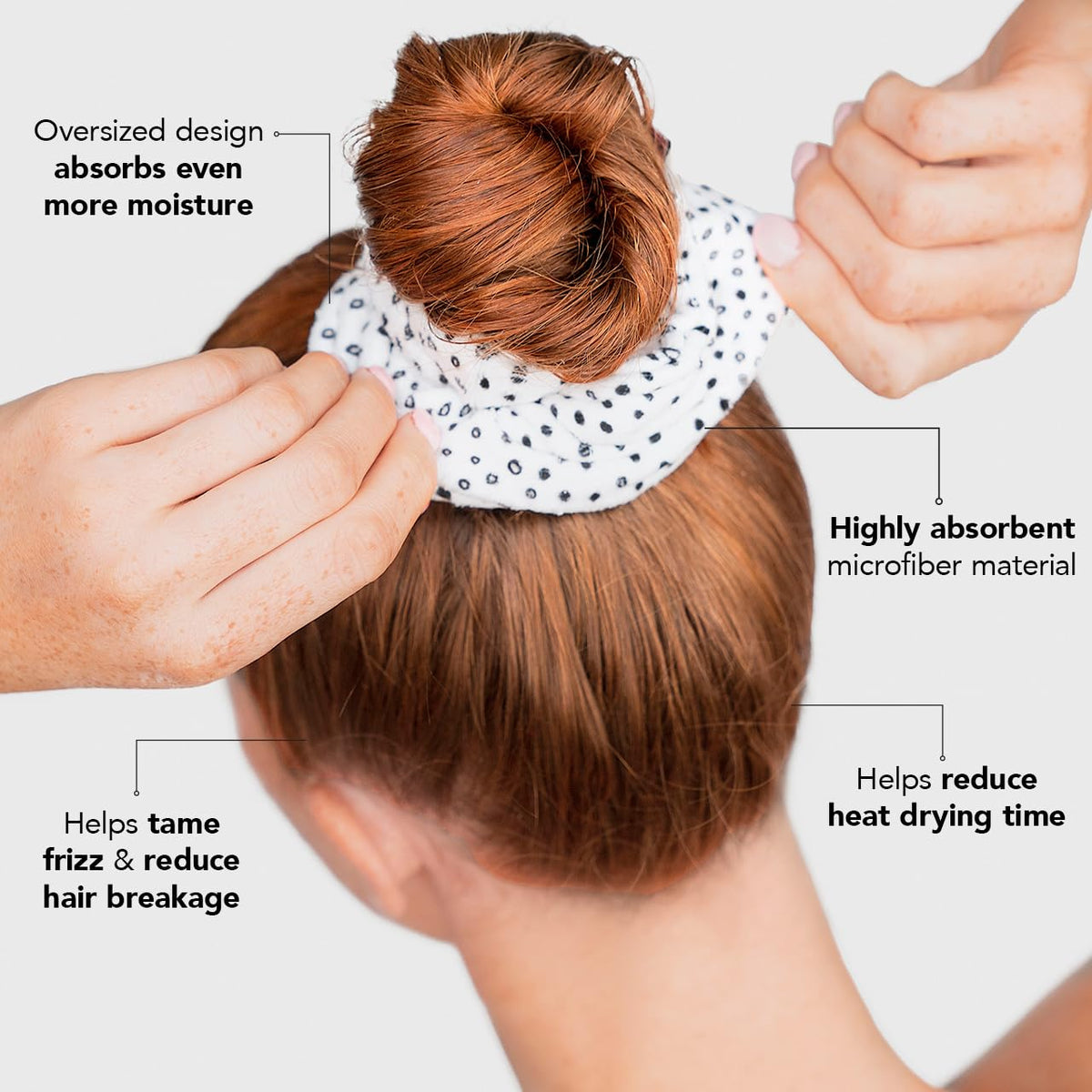 Kitsch scrunchie securing hair and reducing drying time in use