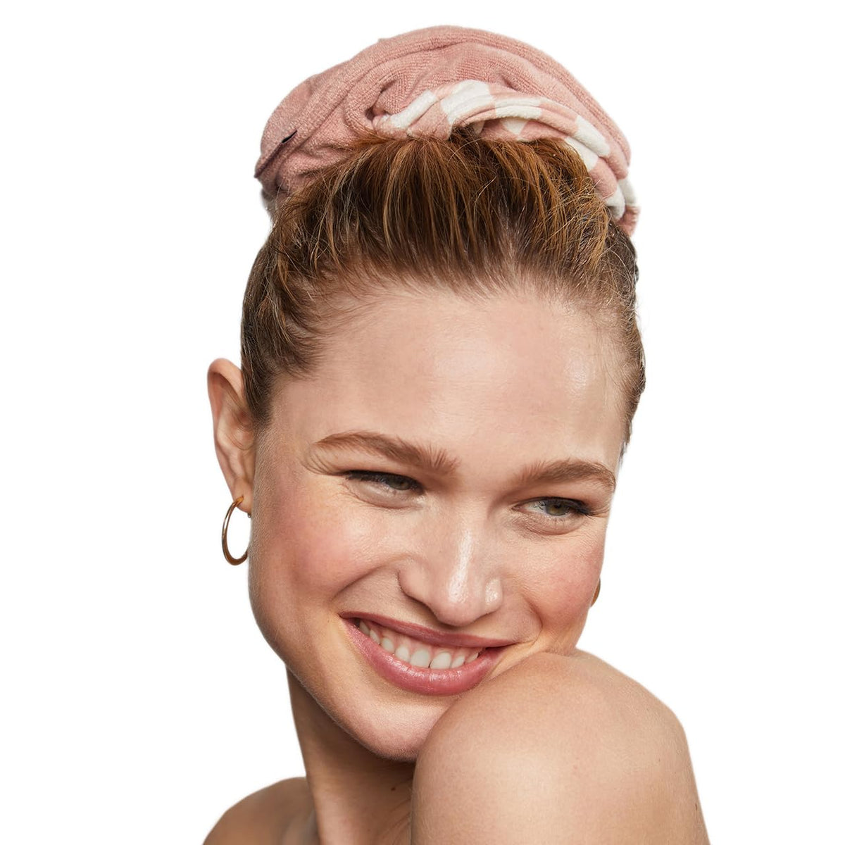 Kitsch scrunchie securing a bun demonstrating hands-free drying benefit