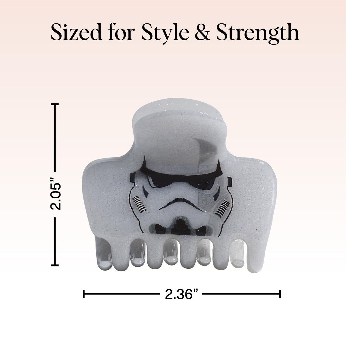 Kitsch Stormtrooper beside hand showing medium size and portability