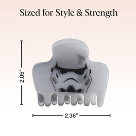 Kitsch Stormtrooper beside hand showing medium size and portability