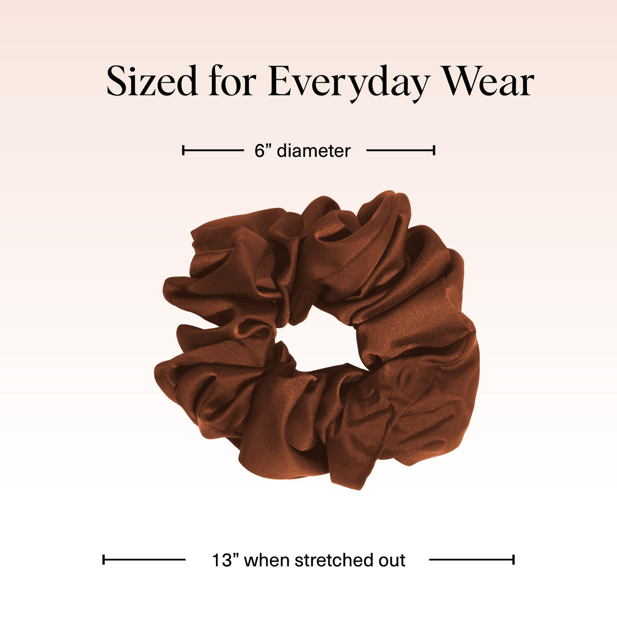 Lifestyle image of Kitsch scrunchie worn on wrist as accessory adding outfit polish