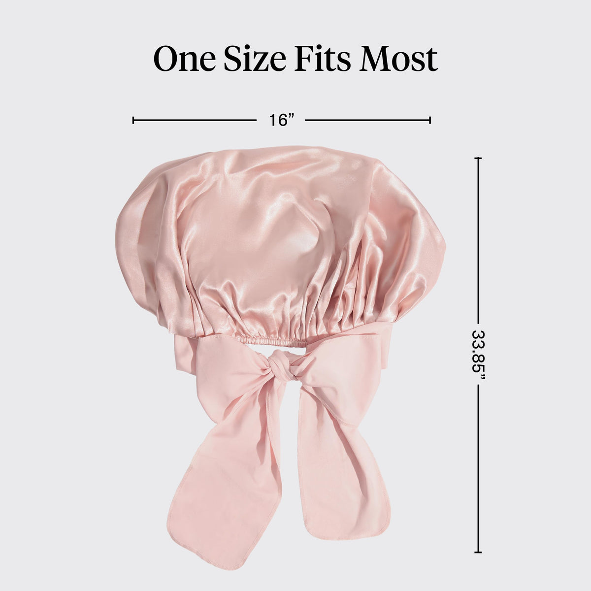 Kitsch bonnet modeled on curly hair illustrating preserved curls overnight
