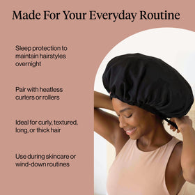 Kitsch bonnet covering hair set in heatless curlers to preserve curls